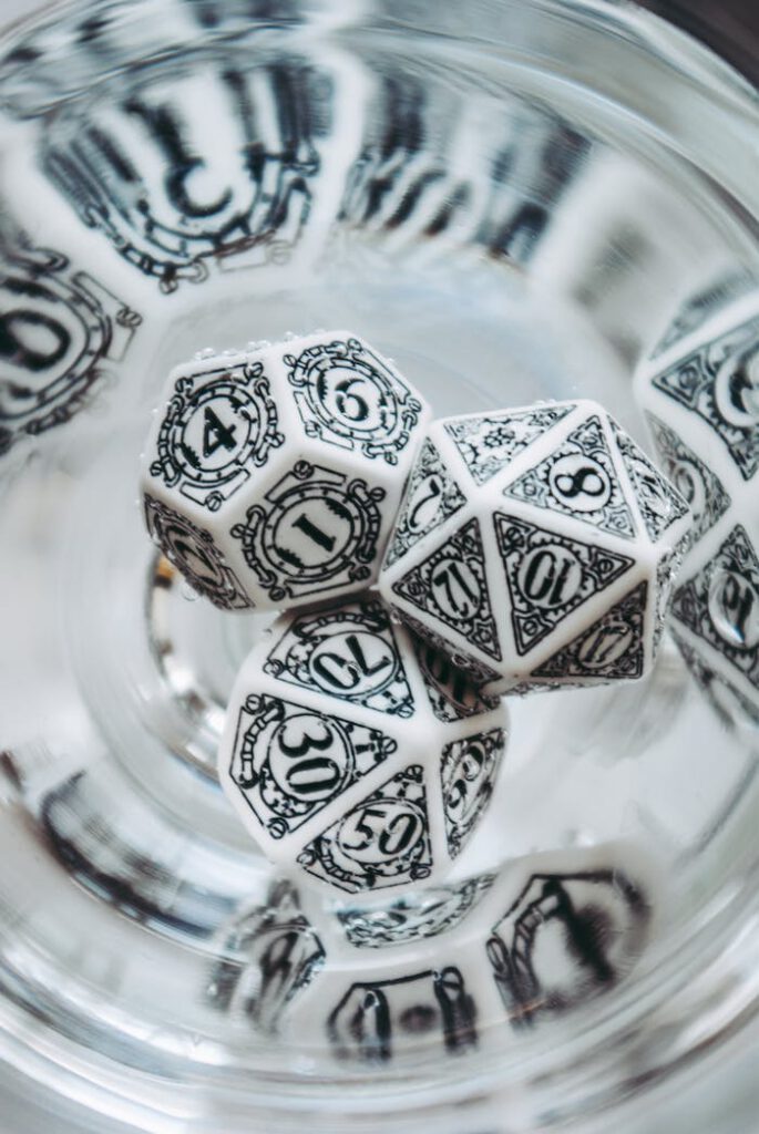 A Close-Up Shot of White Dungeons and Dragons Dice